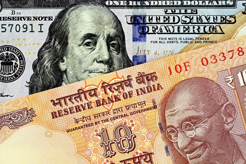  USD/INR settles higher near 83.70 amid firm US Dollar