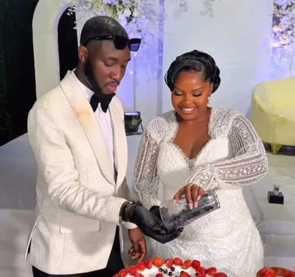 Watch This Newlywed Couple Spice Their Cake-Cutting Moment With a Unique Twist
